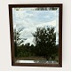 Small beveled mirrorin a wooden frame*DKK 450